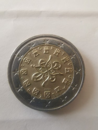 Una moneta euro circolata - una, 2